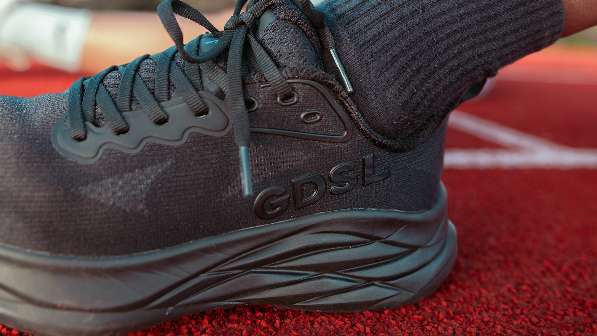 Goodsole Motion — Black/Black on the track